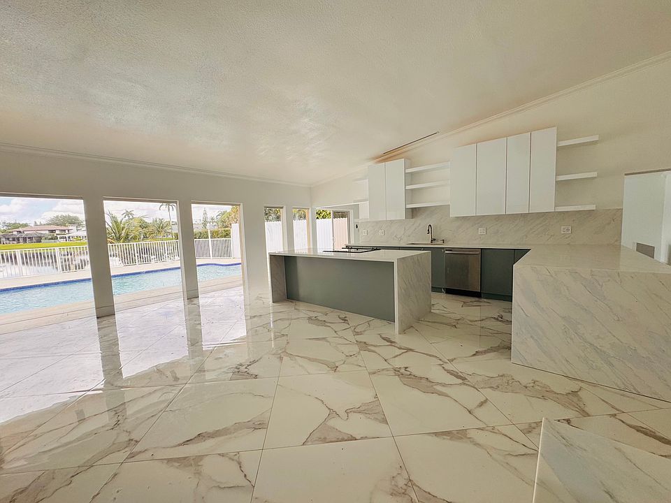 Kitchen with pool and lake view