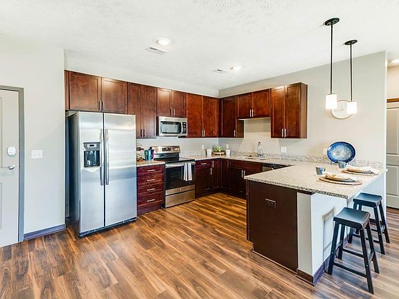 Our kitchens combine functionality and style with plenty of storage and modern appliances to enhance your culinary experience.