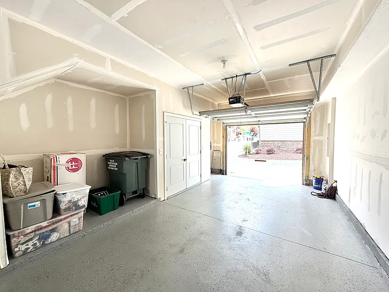 2 car tandem garage with open and closet storage