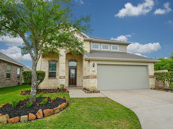 Curb appeal galore! Immaculate landscaping and beautiful trees give this charming home a welcoming feel from the moment you pull up.