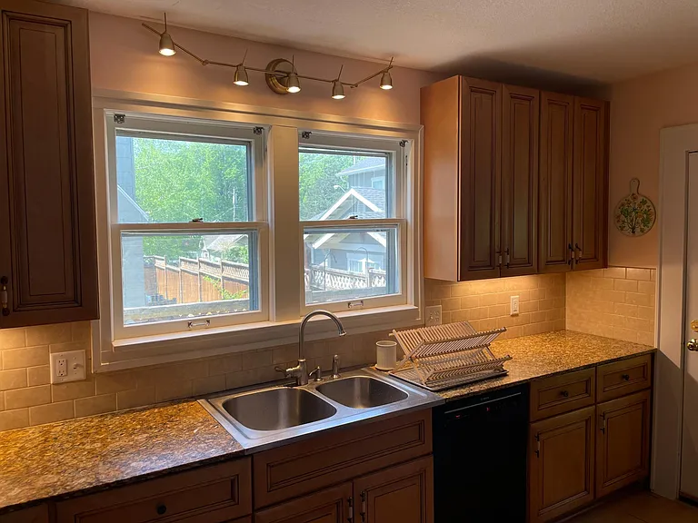 Door on the right leads to laundry room and backyard