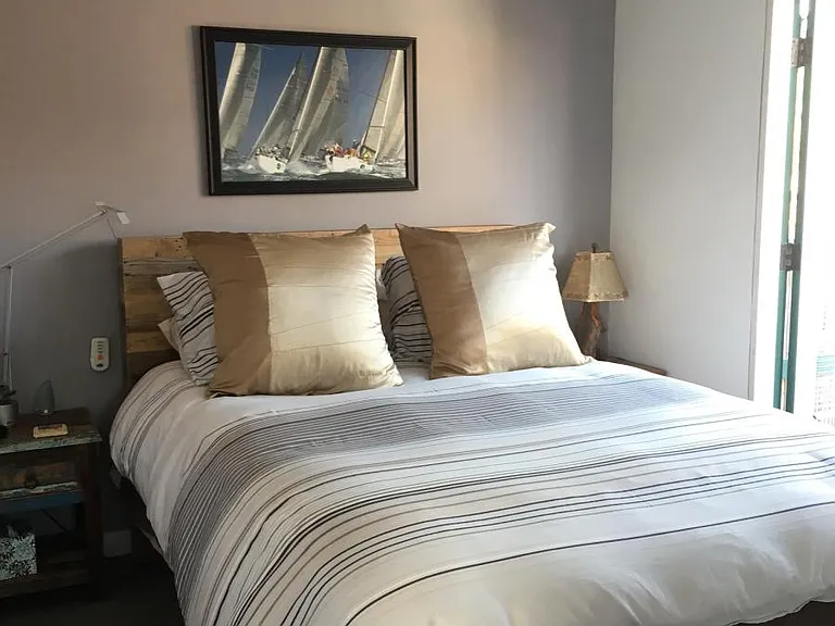 Queen size bed, with A/C in the bedroom!