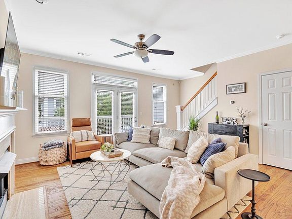 Living room seamlessly flows out to the large private deck