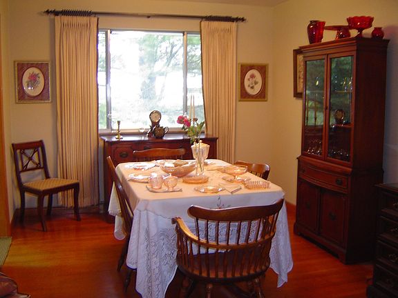 Light filled dining room with large picture window