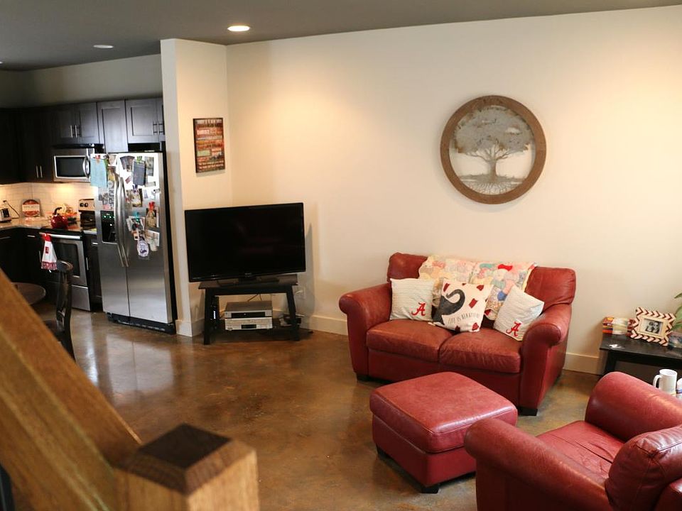 Living/ kitchen stained concrete floors