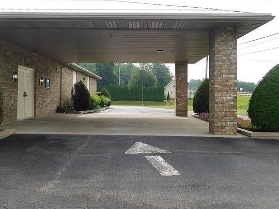 LARGE FRONT CANOPY ON FRONT ENTRY.  WILL FIT EMERGENCY VEHICLES