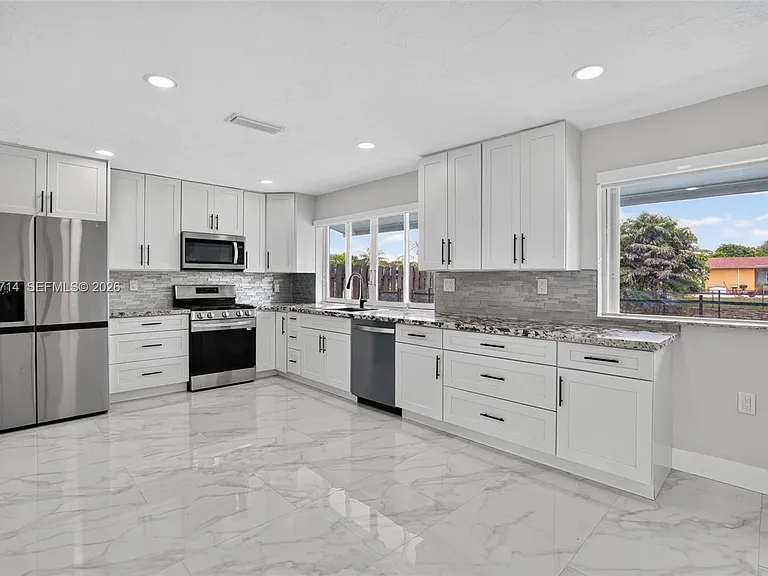 9531 NW 20th Pl — Photo 7