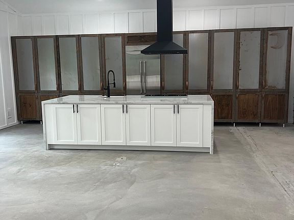Custom made tall cabinets with 
soft-close