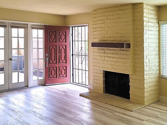 Enter the living room complete with a fireplace for cooler evenings.