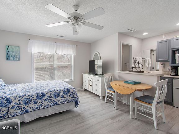 5th image of 3350 Club Villas Dr #203