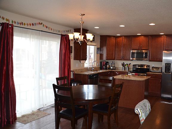 Dining area opens to patio/backyard