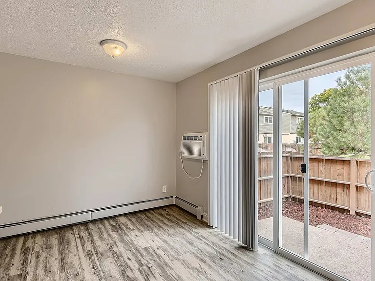 A Dining Room with Air Conditioning at Alder Square Rental Townhomes