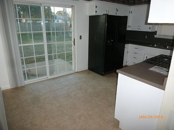 Dining/ Kitchen Sliding doors to patio