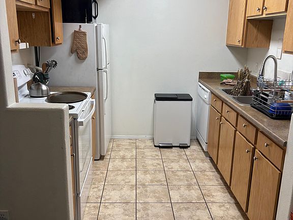 Kitchen with dishwasher, garbage disposal, and microwave, other