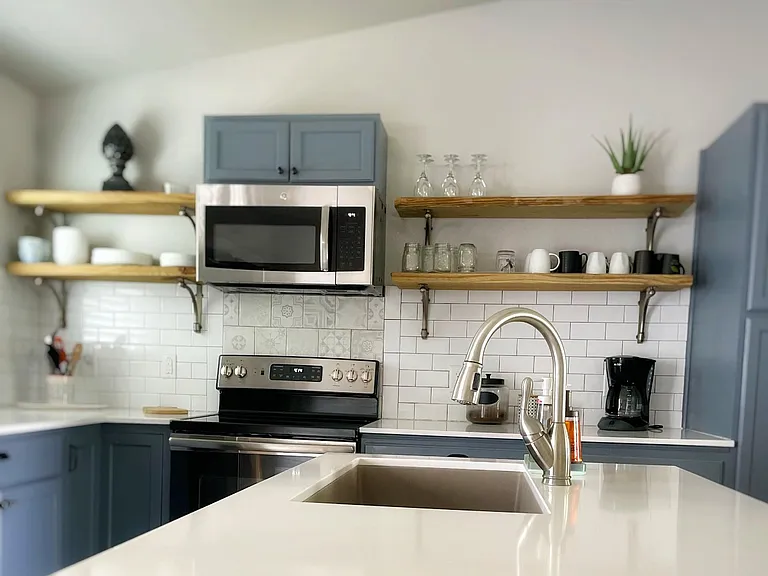 Large farm sink and quartz countertops