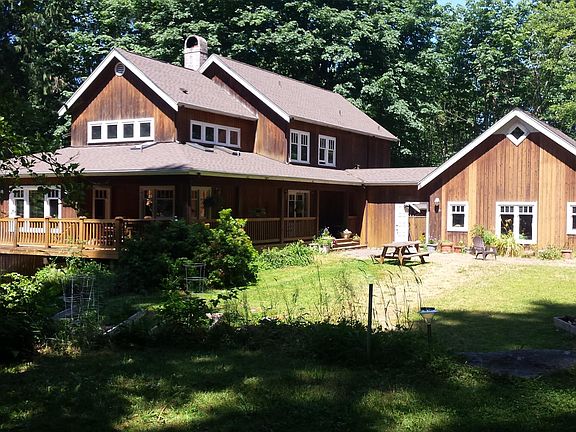 Cedar House: One person (homeowner) lives on the main floor, and there is also a top-floor apartment.