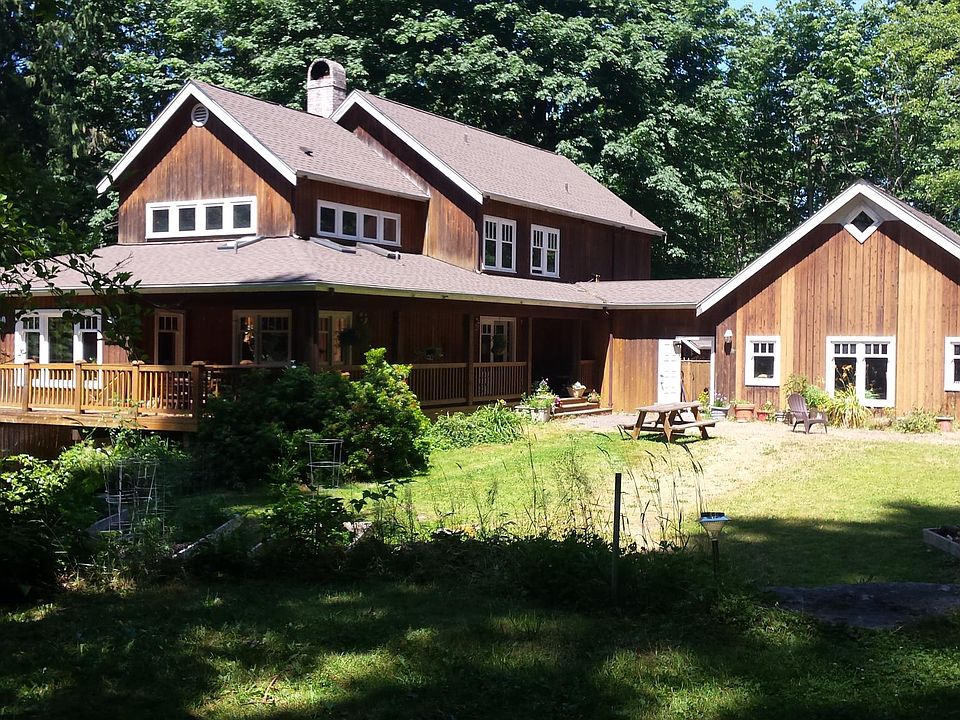 Cedar House: One person (homeowner) lives on the main floor, and there is also a top-floor apartment.