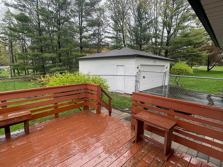 Newer detached 2 stall garage less than 10' from fenced area
