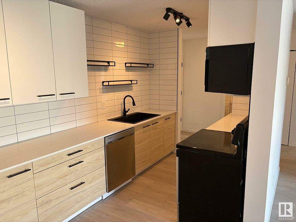 1st image of 10615 110th St NW #302