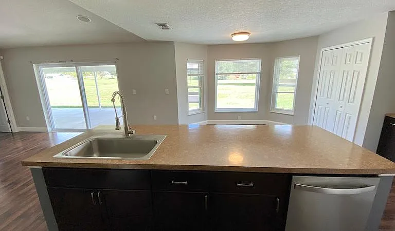 Large family/kitchen/dining combo view #5