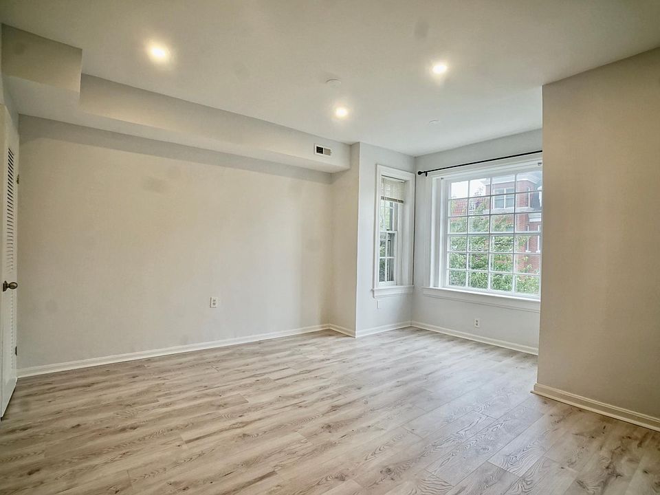 Living room with huge, gorgeous, historic windows