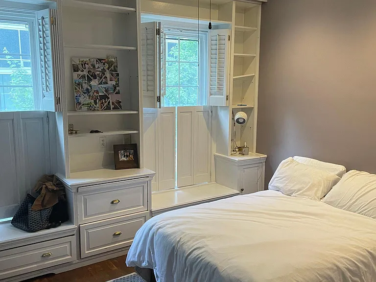 BR. with built-in cabinets, shelves , closets and full bath
