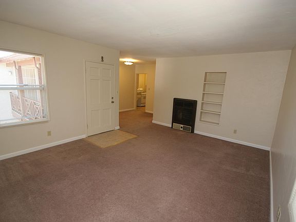 Living area looking towards dining & kitchen area.