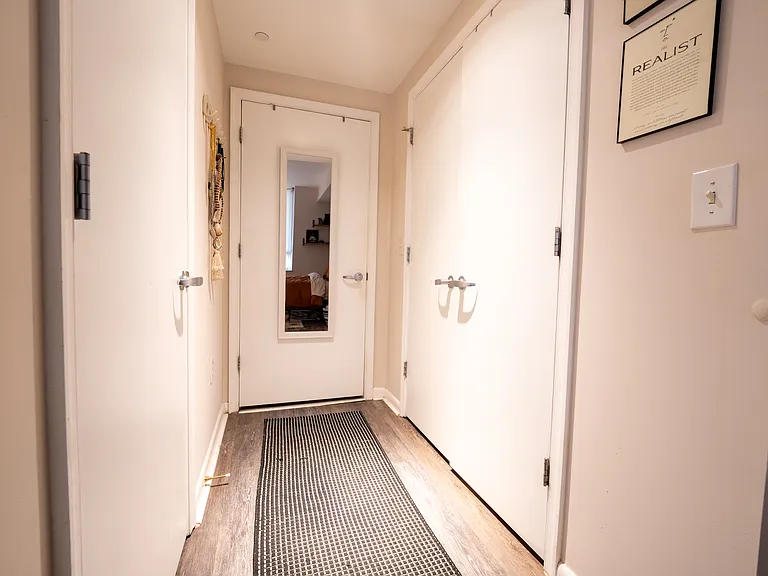 two closets with custom built Elfa shelving