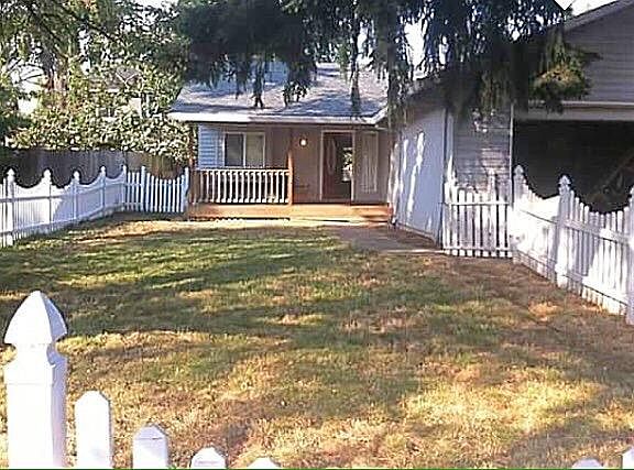 Front Yard with Vinyl White Picket Fence