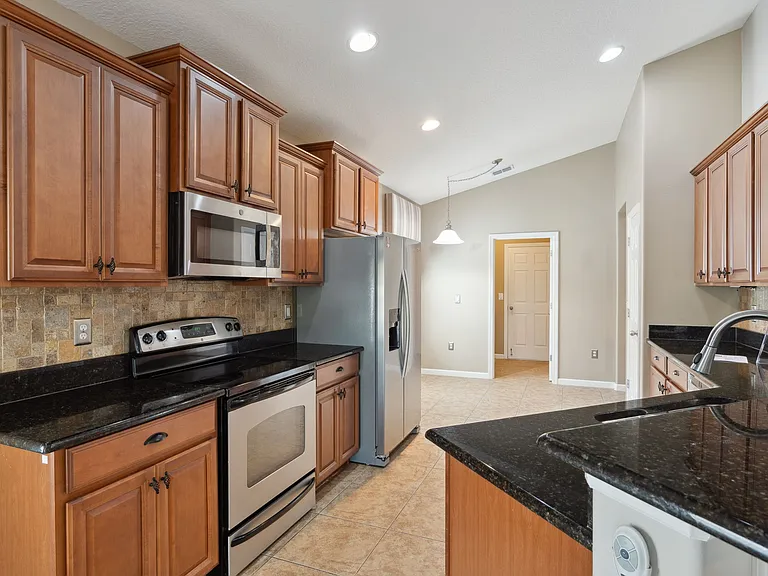 Kitchen (Room for a table and chairs near the laundry room door)
