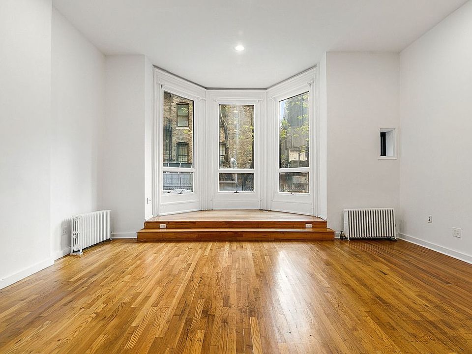 1st image of 107 E 60th St Fl 2