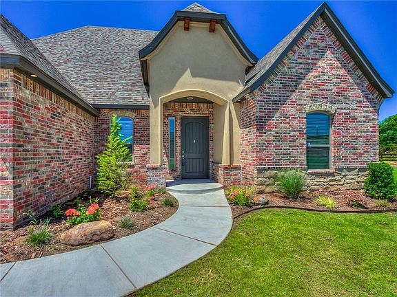 Beautiful porch with landscaping!