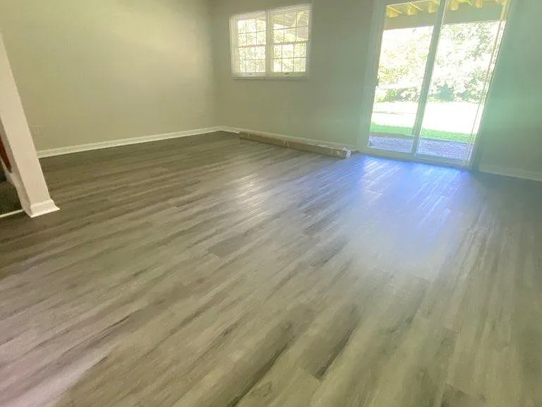 Large basement family room, walkout to paved patio. Ceiling fan.