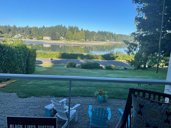 Lower patio with 6 Adirondack chairs for enjoying the view, morning coffee and evening beverages.
