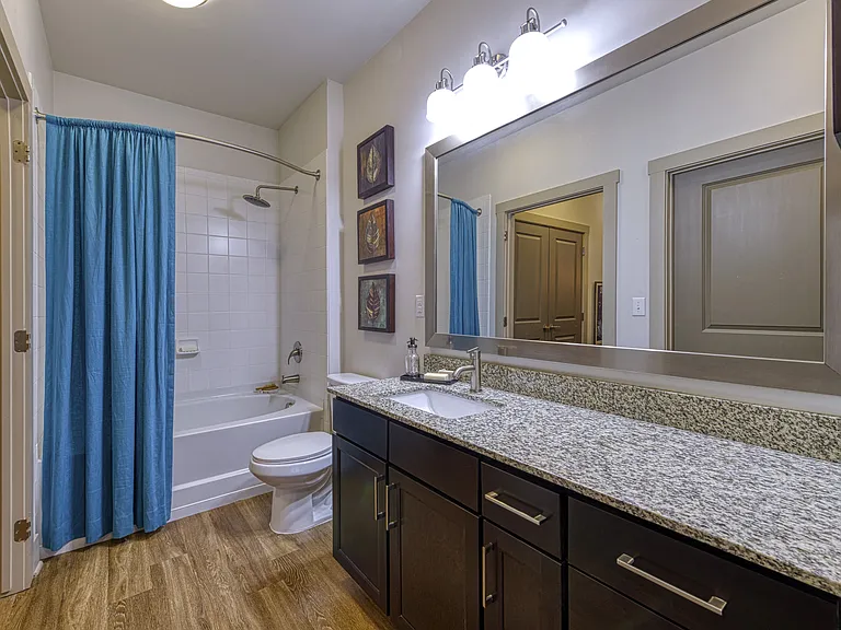 En-Suite Bathrooms with Granite Countertops