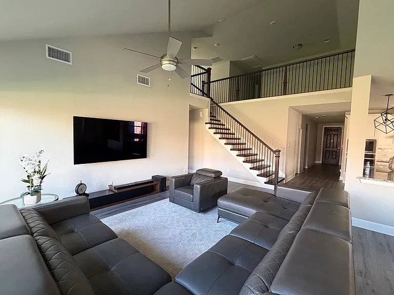Living Room and Stairs to 2nd Floor