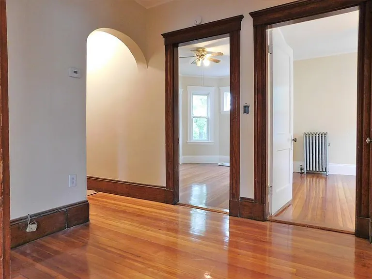 Entryway with view into living room and bedroom #1