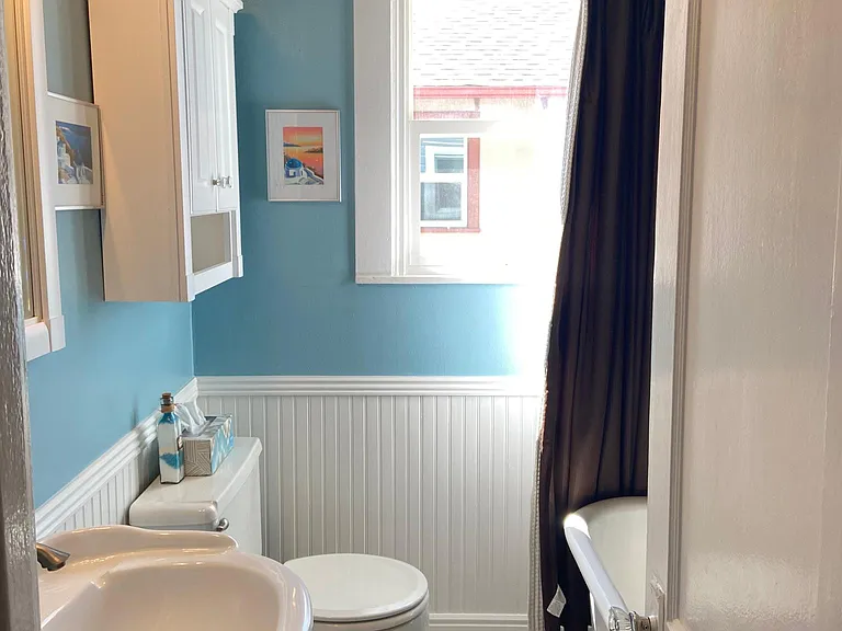 Upstairs bathroom claw tub and shower