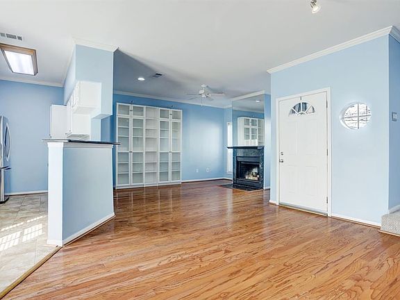 Open concept living with hardwood floors.