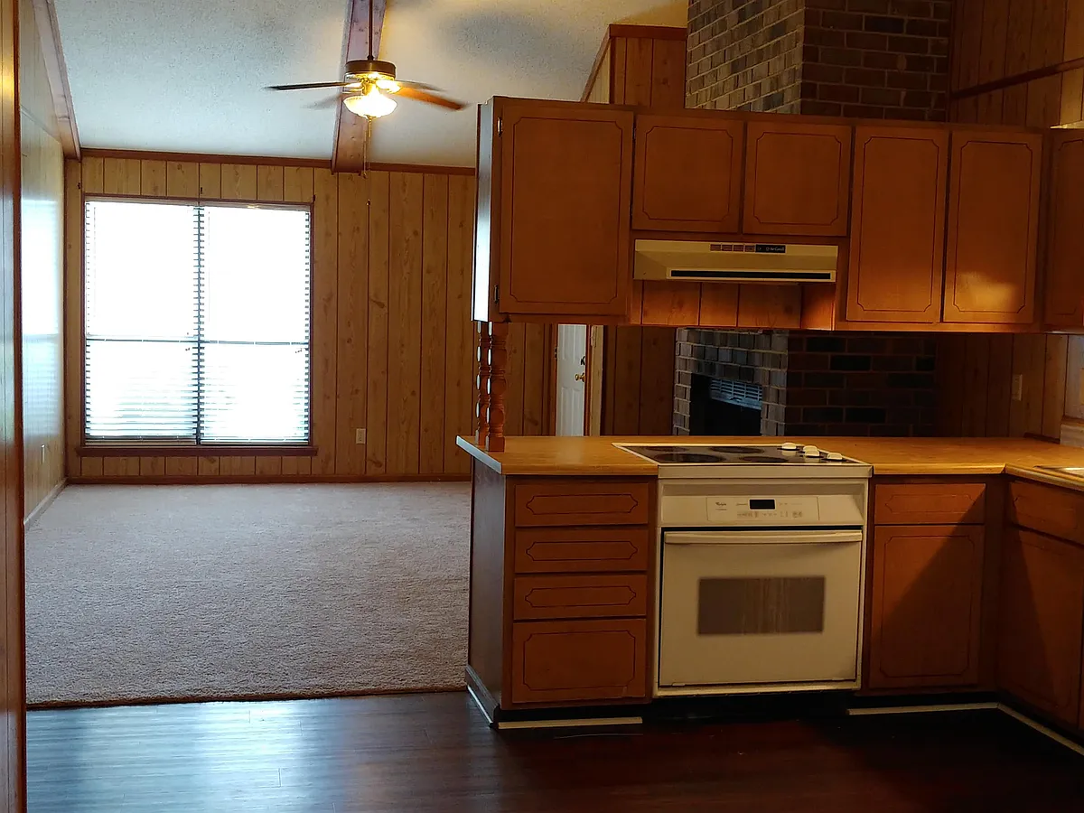 Living room open to the kitchen/dining area - 1909A Buck Ln
