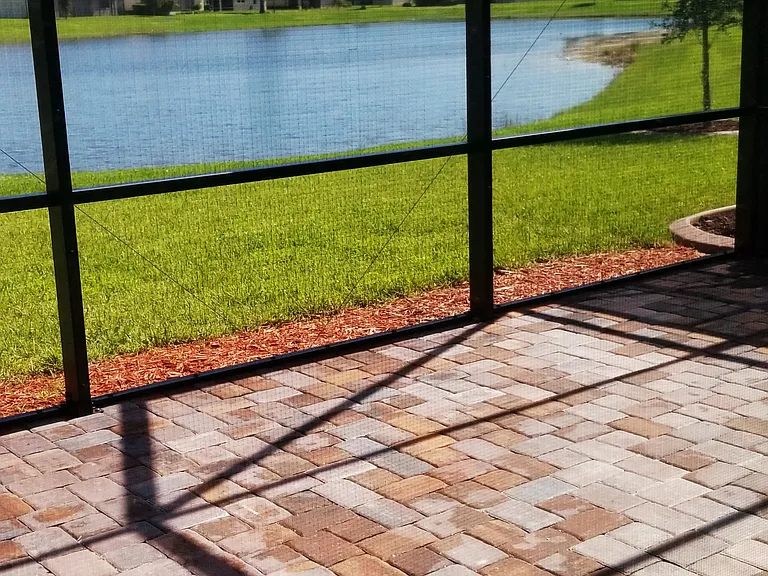 Beautiful Lake View! Expansive Screened Lanai with new pavers.