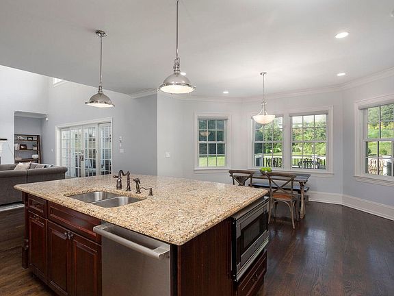 Gourmet Kitchen Opens to Family Room w/French Doors to Deck and Patio for Outdoor Entertaining