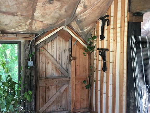 3 season room with hobbit door