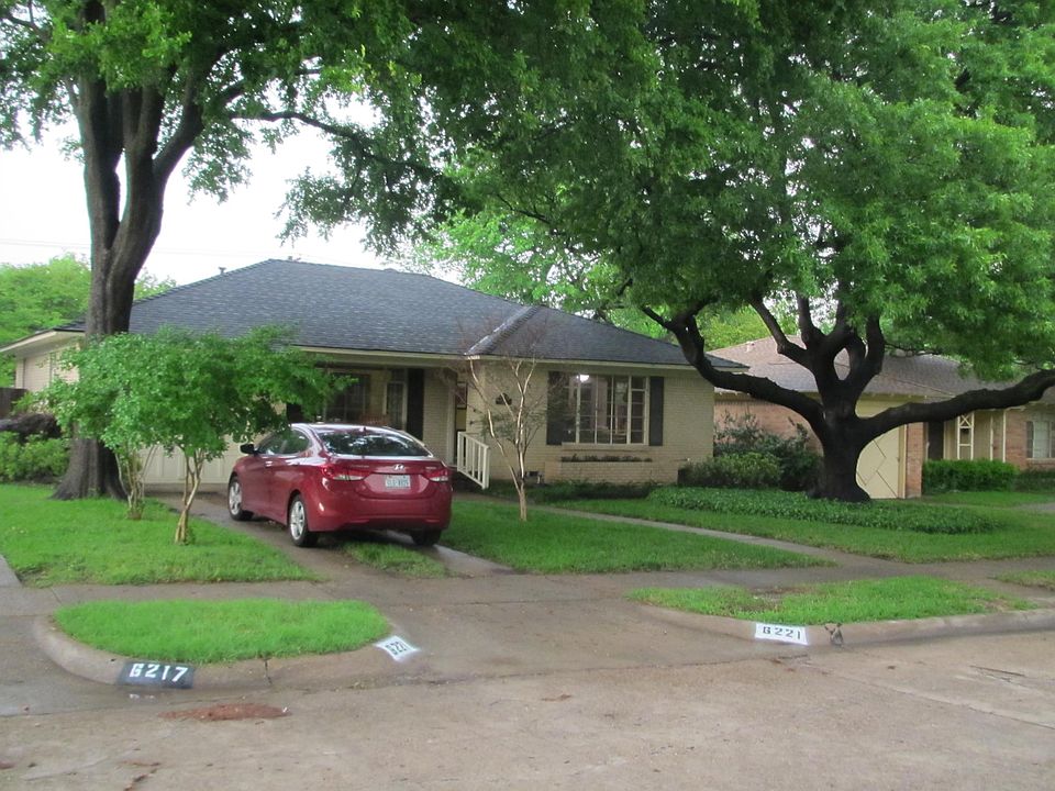 Older photo to show shady front yard with nice front porch. Tree on left is gone now, rip.
