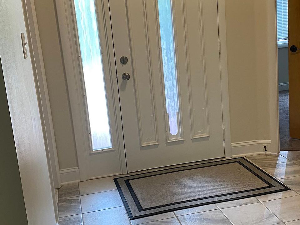 Foyer, new tile flooring, new locks