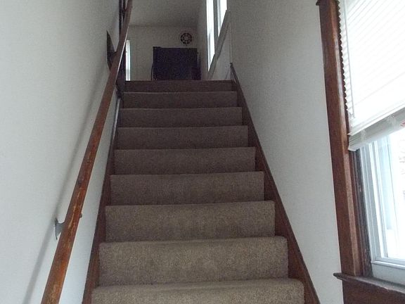 Private entrance leading to upper level apartment