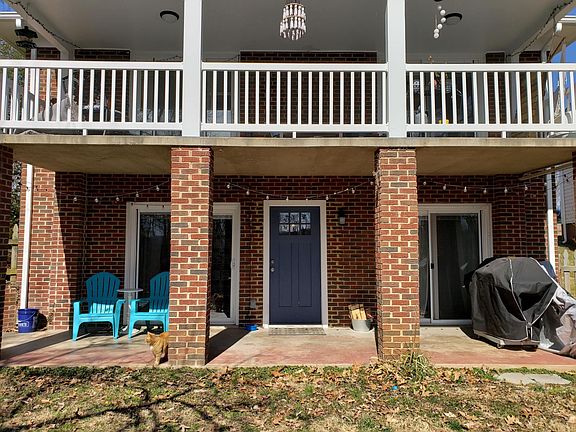 Private rear entrance with covered porch