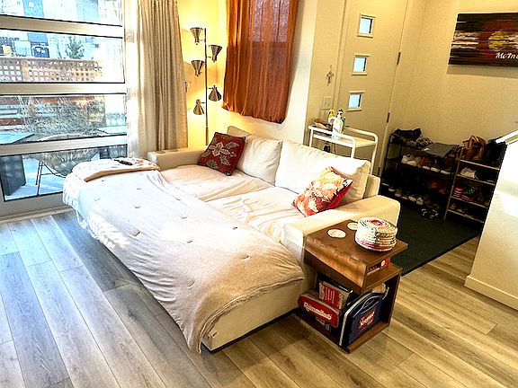 Living Room with roll-up garage door