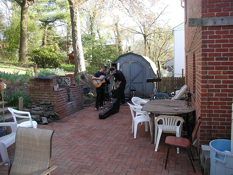 Back patio, shed and fire pit