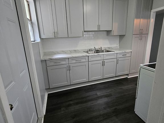 Brand new kitchen cabinets and countertops.